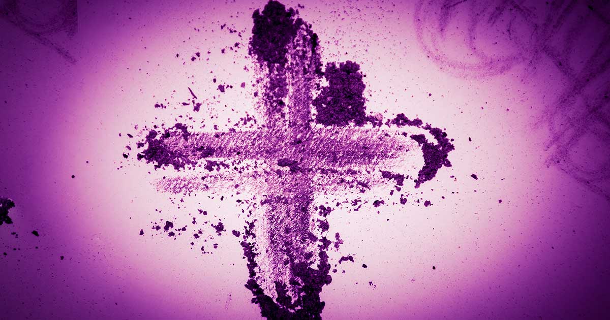Image of a cross in ashes