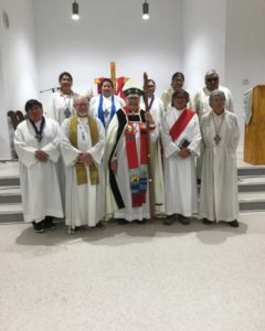 Bishop Thomas Corston (retired Bishop of Moosonee) with the Rev. Leo Friday, lay readers and clergy of St. Paul’s Kashechewan